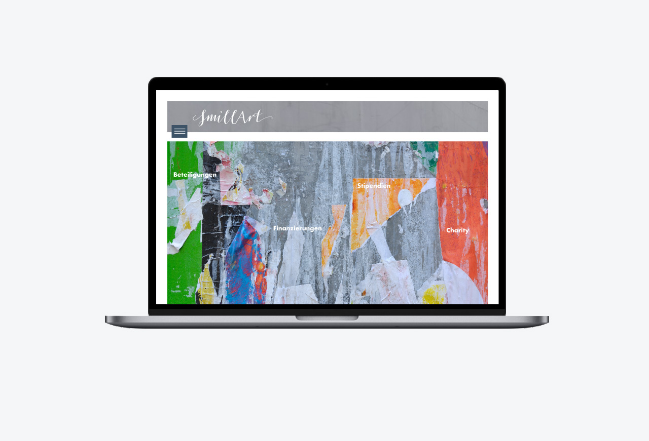 SmillArt Webseite auf Laptop-Display